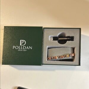 Gold and Black Cuff Links opened this box to show all boxes are sealed